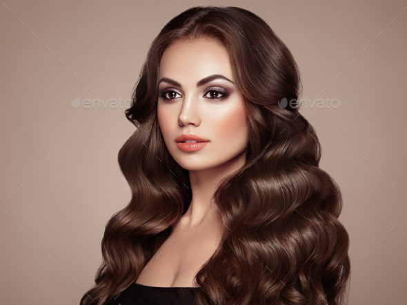 Brunette woman with curly hair - Stock Photo - Images