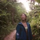 Young Female Explorer Smiling and Hiking in the Forest Mountain Trail - VideoHive Item for Sale