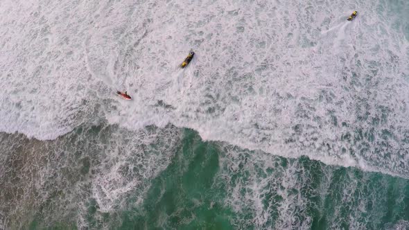 Aerial view of lifeguard surf rescue jet ski personal watercraft in Hawaii alt