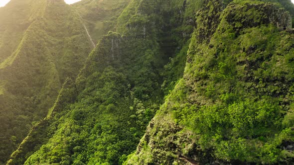 Haena State Park. Picturesque Thin Waterfall Among the Tropical Green. Hawaii alt
