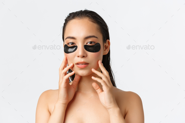Skincare, women beauty, hygiene and personal care concept. Close-up of attractive asian female - Stock Photo - Images