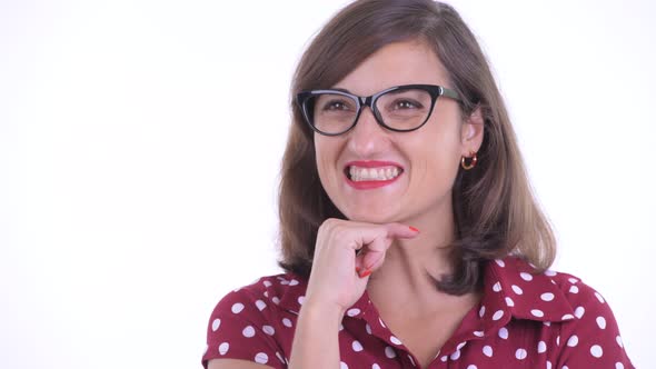 Face of Happy Beautiful Woman with Eyeglasses Thinking and Looking Up alt