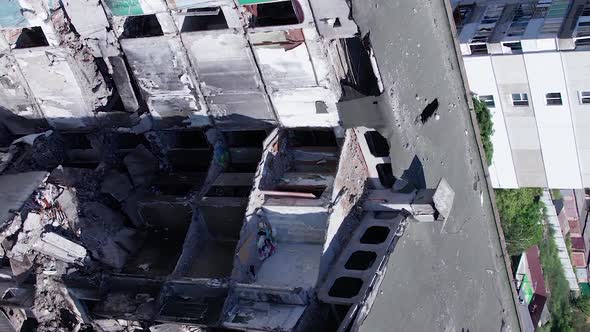 Vertical Video of Civilian Cars Destroyed During the War in Ukraine alt