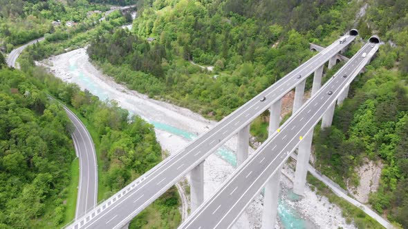 Aerial View of the Concrete Highway Viaduct on Concrete Pillars in the Mountains alt