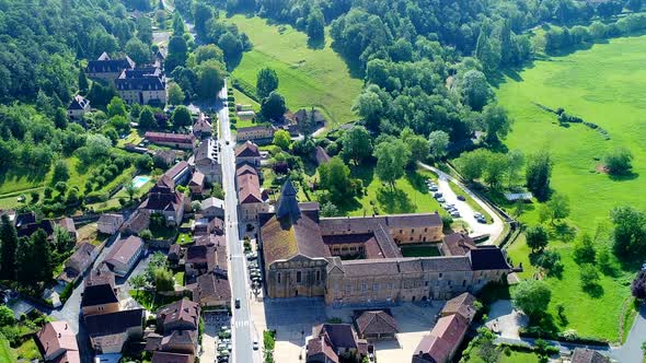Village Le Buisson de Cadouin in Perigord in France seen from the sky alt