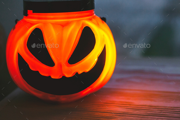 Glowing Jack-o-lantern head in dark Stock Photo by Sonyachny