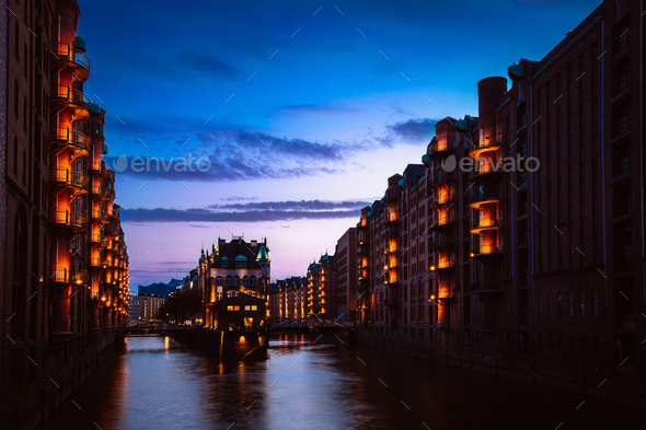 The Warehouse District - Speicherstadt in twilight. Tourism landmark of Hamburg. View of - Stock Photo - Images