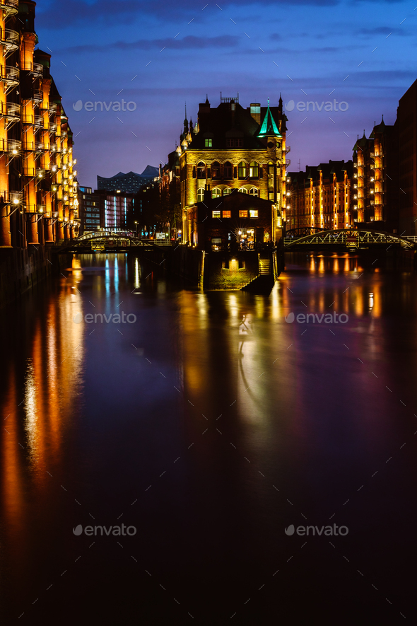 The Warehouse District - Speicherstadt in twilight. Tourism landmark of Hamburg. View of - Stock Photo - Images