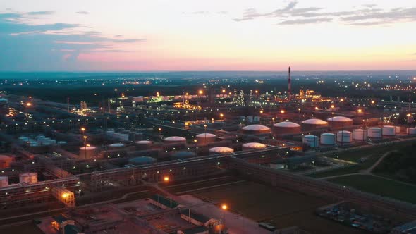 Evening Cityscape with Facilities of the Oilprocessing Factory alt
