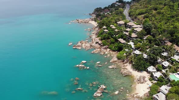 Small Houses on Tropical Island. Tiny Cozy Bungalows Located on Shore of Koh Samui Island Near Calm alt