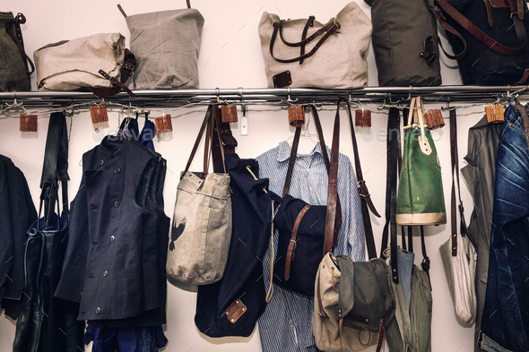 Clothing and bags hanging in workshop