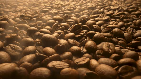 Brown Coffee Beans with Outgoing Aromatic Steam After Roasting alt