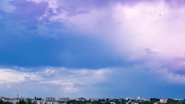 Time Lapse Rainbow Revealed By Clouds in Sky Blue Sky White Clouds alt