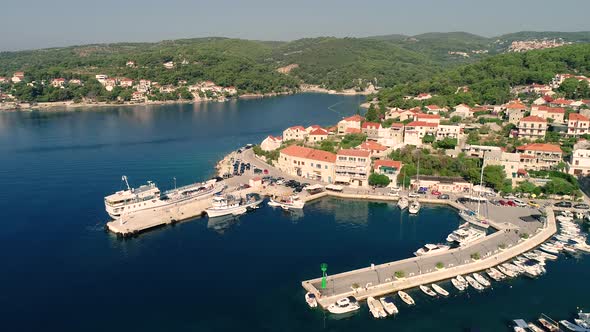 Aerial view of Sumartin port with a ferry transport, Brac island, Croatia. alt