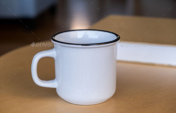 Download Placeit Coffee Mug Mockup On A Wooden Table Blurred Background Stock Photo By Rawf8