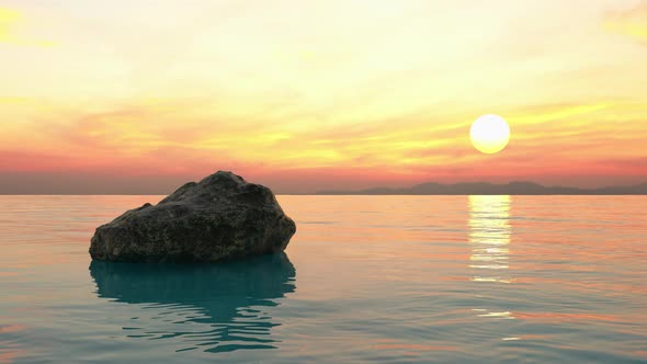 Beautiful tropical landscape at sunset overlooking the sea and a large stone in the water.