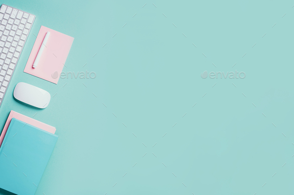 White mouse, keyboard, notebook, pen on blue background. Top view. Copy  space. Flat lay. Remote job Stock Photo by jchizhe