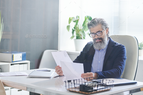 HR Manager Reading CV Papers - Stock Photo - Images