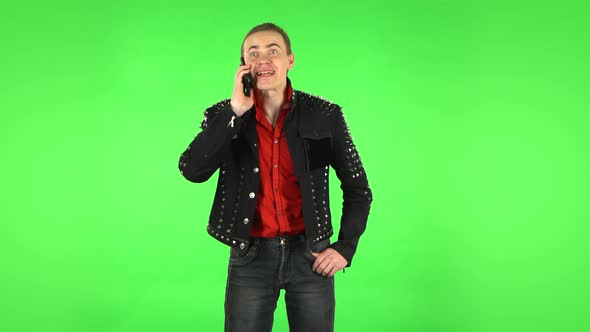 Guy Talking for Mobile Phone, Very Shocked Then Rejoice. Green Screen alt