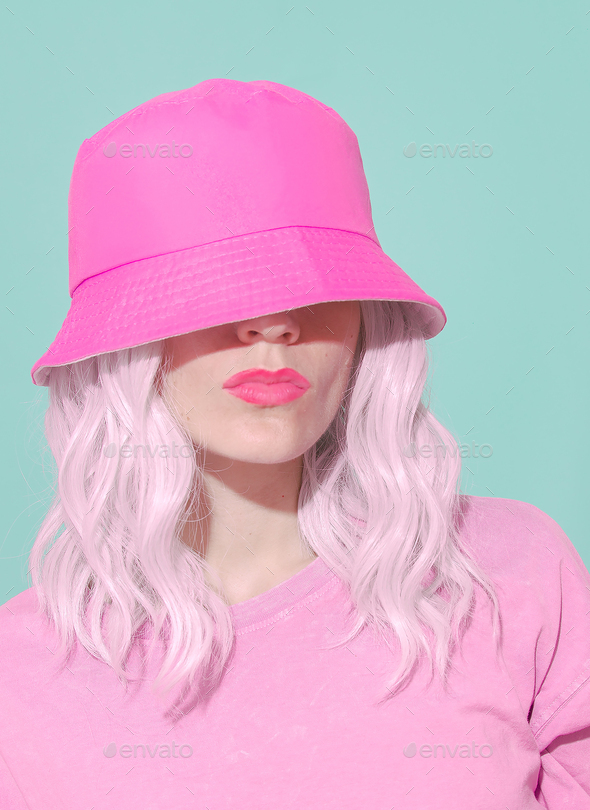 Fashion aesthetic girl in trendy summer accessories. Pink Bucket