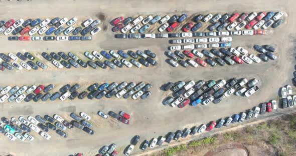 Aerial Bird View Used Car Lot with Ready for Car Market Dealers and Distributors Logistics Parking alt