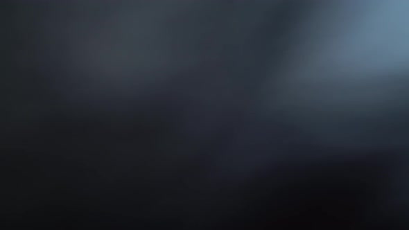 Cloud of Cigarette Smoke on Black Background alt