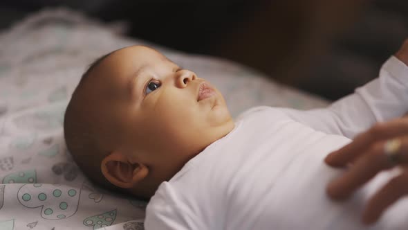 Adorable Baby Holding Father Hand alt