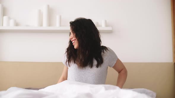 Happy Awakening New Day Rested Woman Cozy Bedroom alt