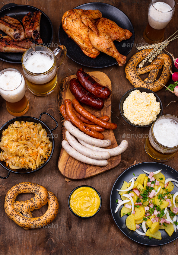 Oktoberfest Dishes With Beer Pretzel And Sausage Stock Photo By