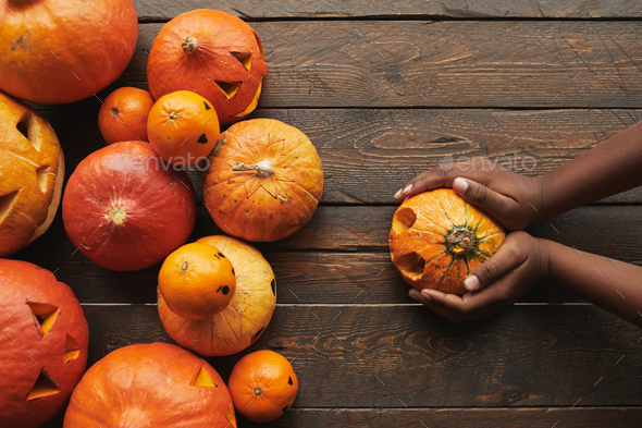 Woman Holding Pumpkin Flat Lay - Stock Photo - Images