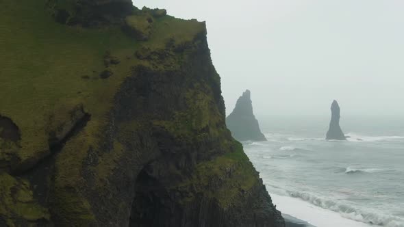 Reynisdrangar Rocks and Reynisfjall Mountain. Reynisfjara. Iceland. Aerial View alt