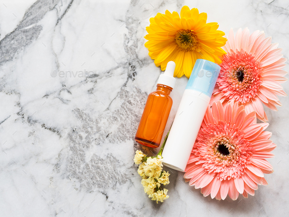 Face cream and serum in glass bottle. Skin care - Stock Photo - Images