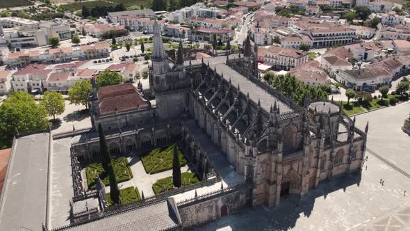 Inner courtyard of the Batalha monastery in Portugal. Gothic style Unesco landmark. Aerial view alt
