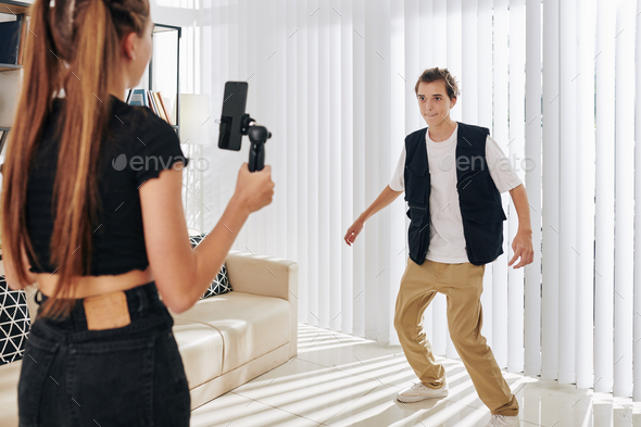 Teenagers filming dance video