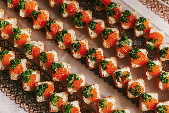 Delicious finger appetizers table at wedding reception - Stock Photo - Images