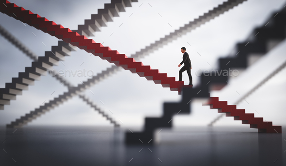 Businessman going upstairs on his selected way. - Stock Photo - Images