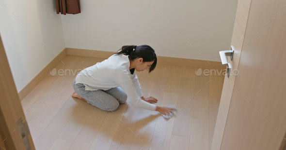 Asian Woman clean the floor for spring clean