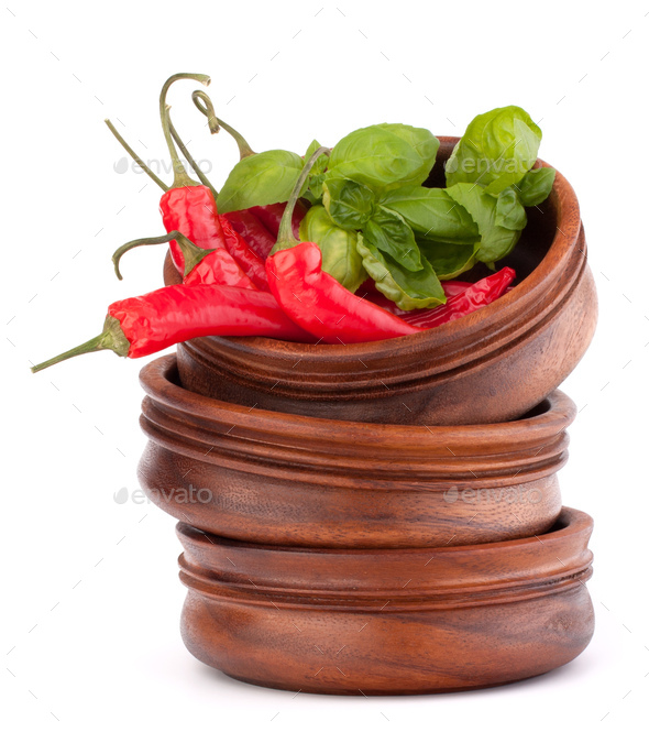 Hot red chili or chilli pepper in wooden bowls stack - Stock Photo - Images