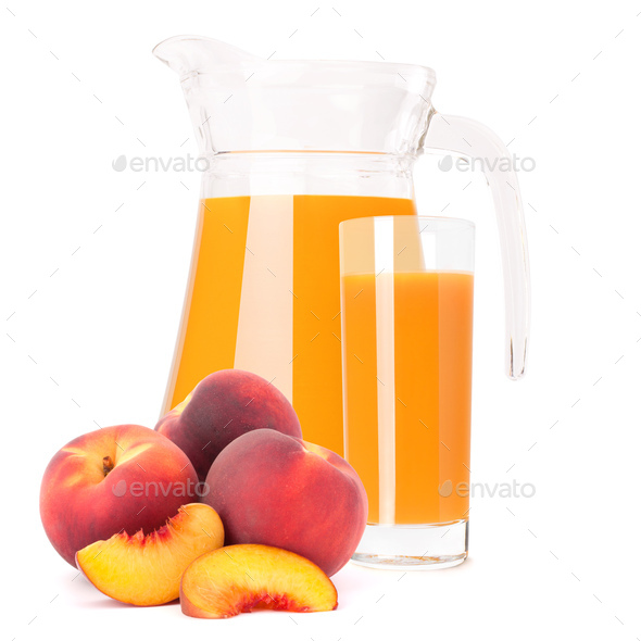 Peach fruit juice in glass jug - Stock Photo - Images