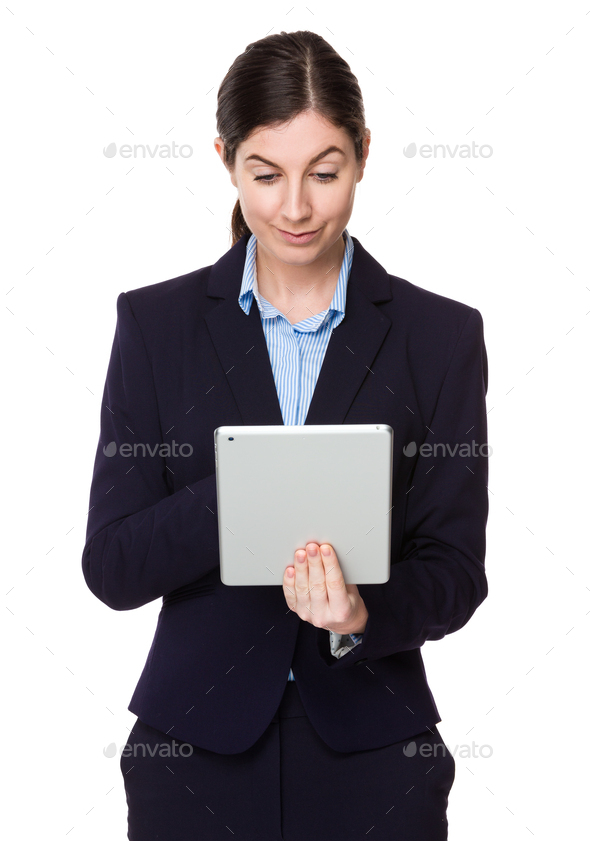 Brunette young businesswoman use of the mobile phone - Stock Photo - Images