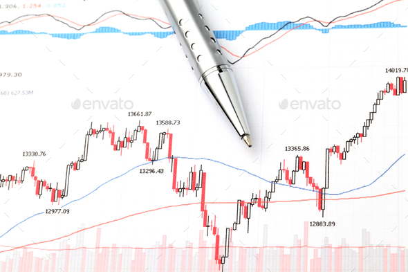 Stock market graph and pen - Stock Photo - Images