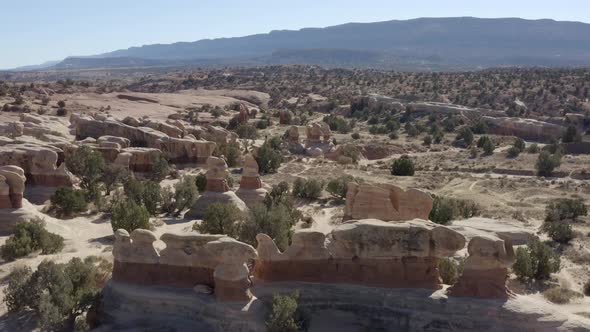 Drone shot through Devils Garden in the Grand Staircase Escalante national monument alt