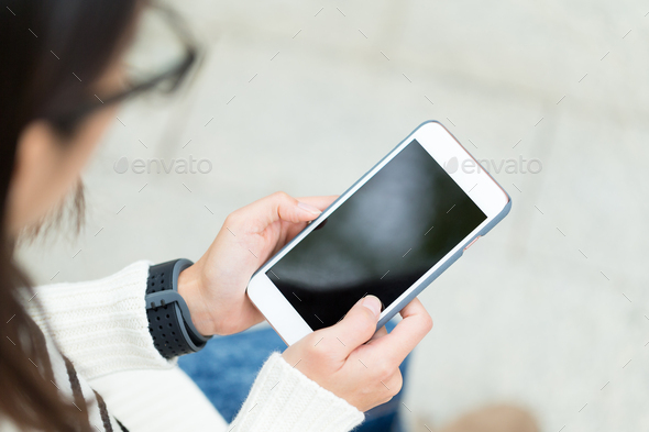 Woman use of smart phone - Stock Photo - Images