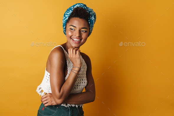Image of joyful african american woman posing and laughing on camera - Stock Photo - Images