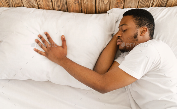 African Man Sleeping After Breakup Alone Lying In Bed Indoor
