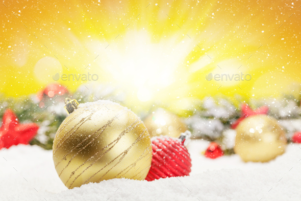 Christmas greeting card with decor in snow - Stock Photo - Images