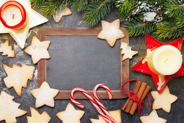 Christmas card with fir tree, cookies and candles - Stock Photo - Images