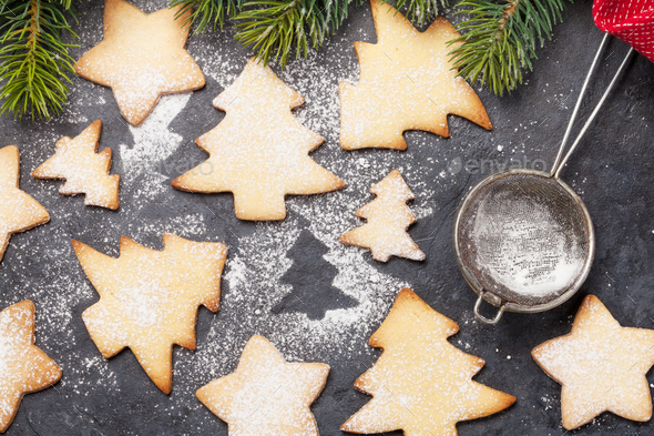 Christmas greeting card with fir tree and gingerbread cookies - Stock Photo - Images