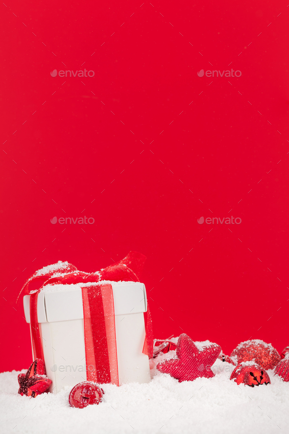 Christmas card with decor in snow - Stock Photo - Images