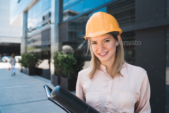Professional architect woman standing outdoors. - Stock Photo - Images